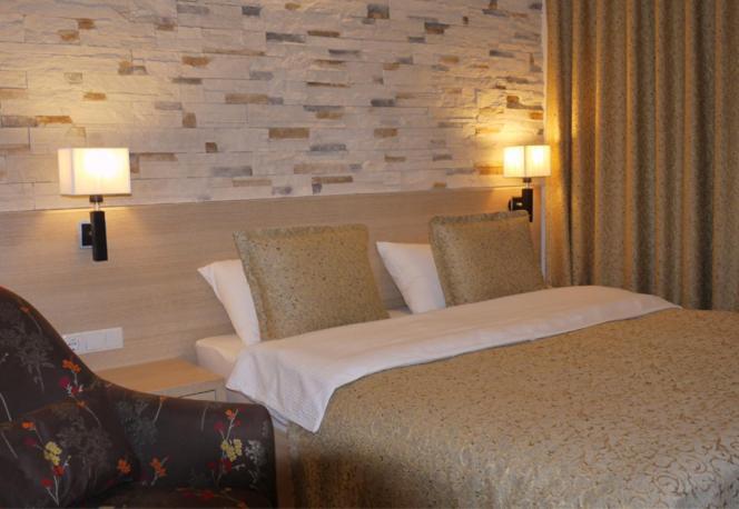 Hotel Pinocchio Priștina Cameră foto